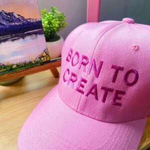 gorra rosa born to create