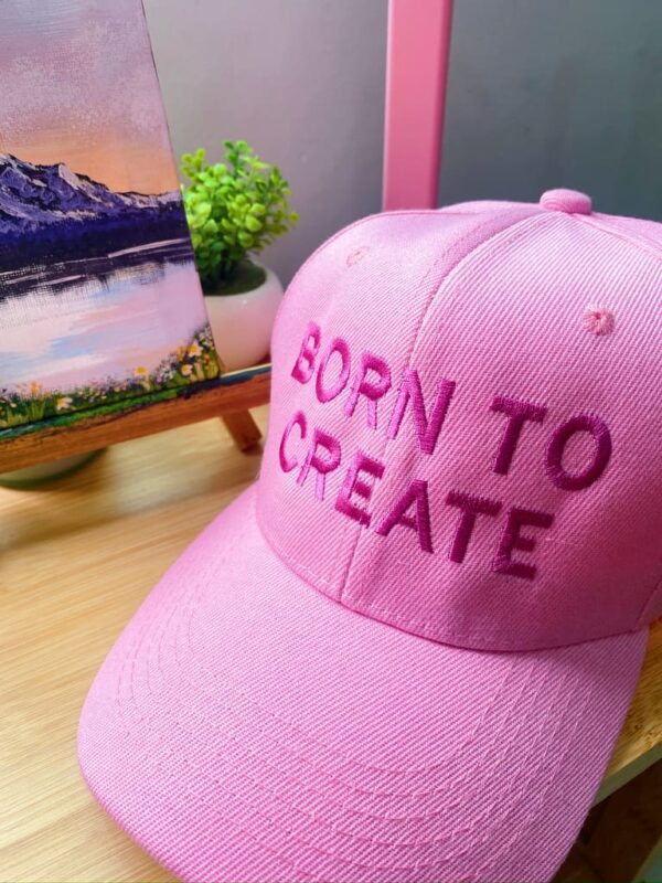 gorra rosa born to create